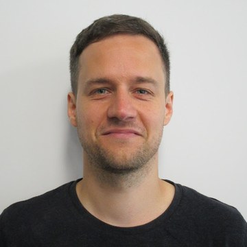 Alexander Zacherl's face, smiling