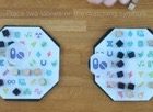 two board game boards with scientific symbols and wooden cubes